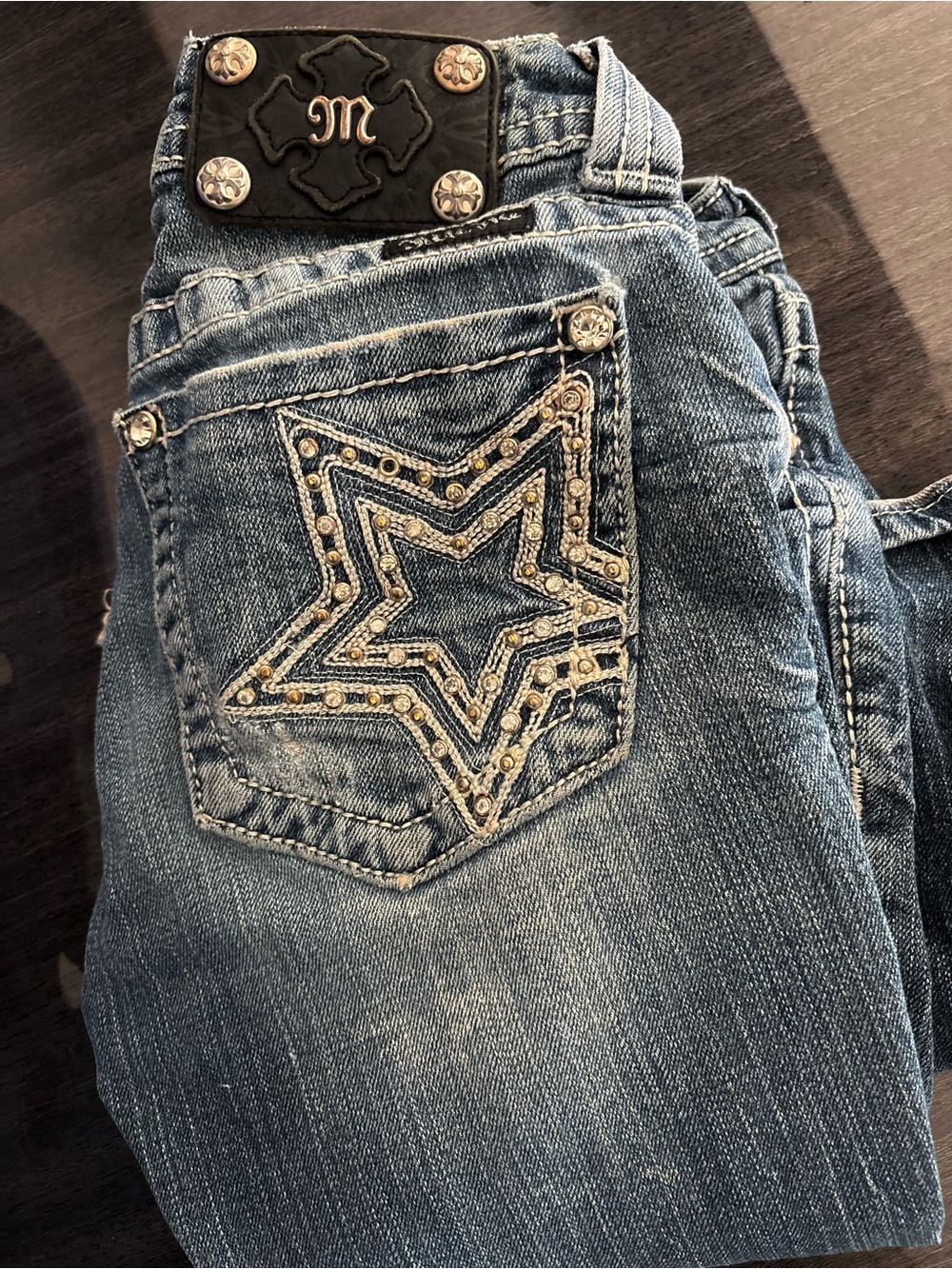 Miss Me low rise Bootcut Jeans with Embroidered Star Pocket